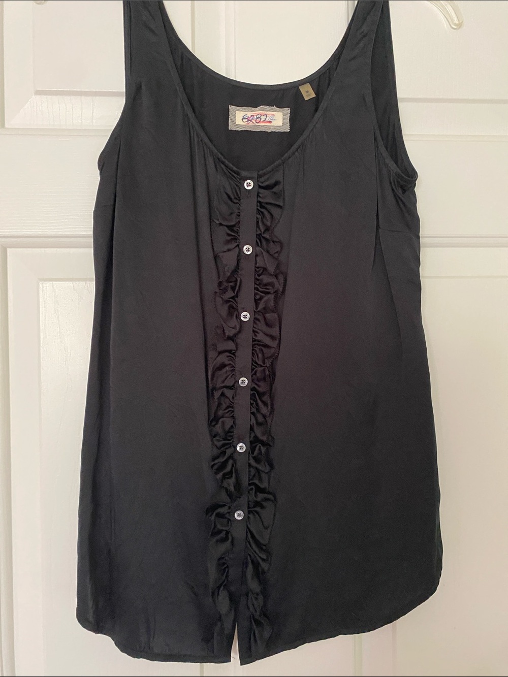 Black Ruffle-Front Sleeveless Top by Martin + Osa